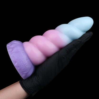 Alicorn the Unicorn dildo, Bubblegum colorway, held in hand for size reference