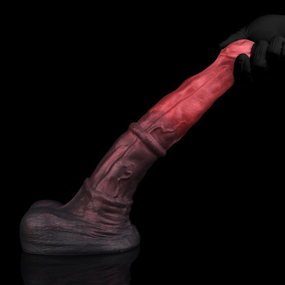 Atlas the Celestial Stallion dildo, Dusk colorway, held in hand showing flexibility