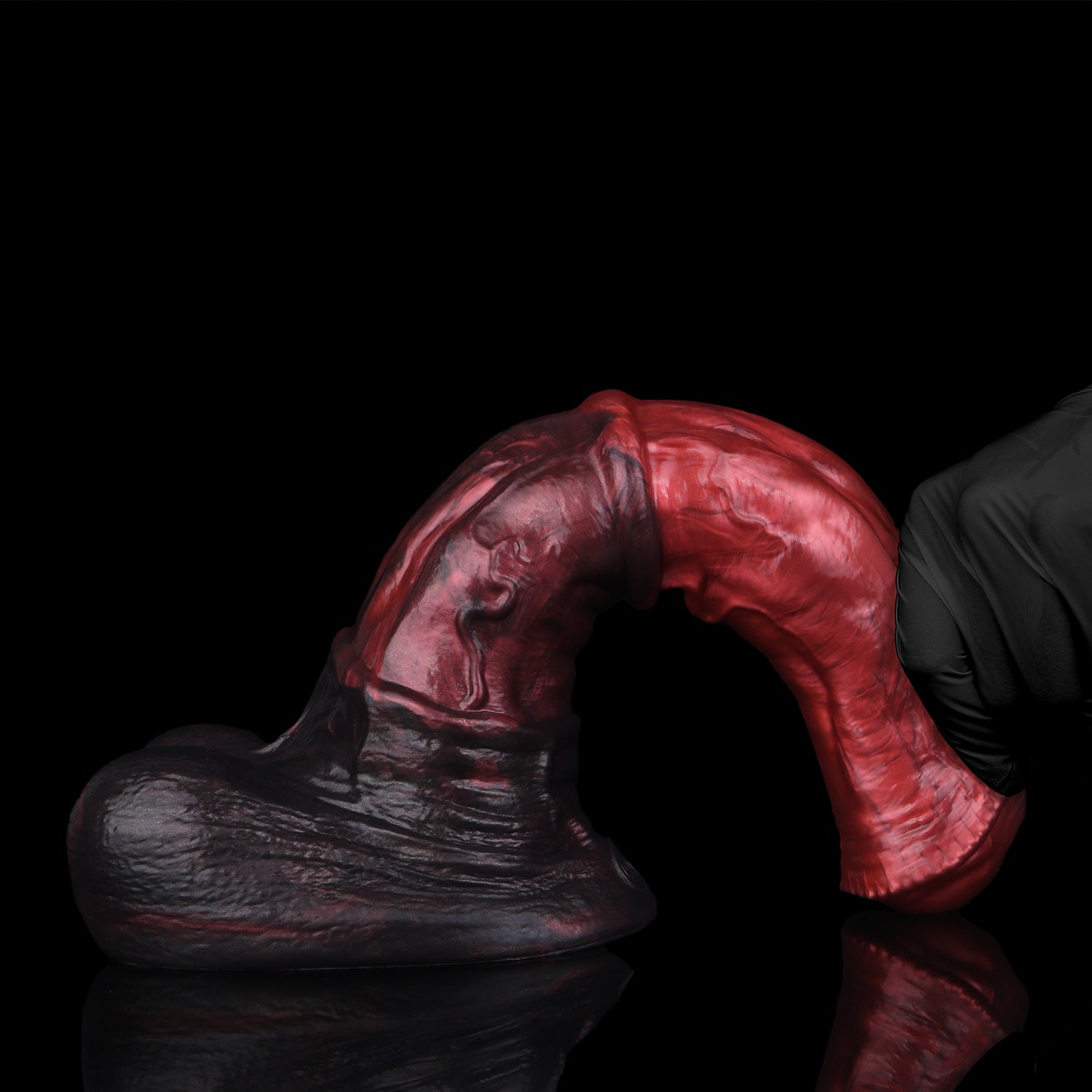 Atlas the Celestial Stallion dildo, Lava colorway, bent to demonstrate flexibility