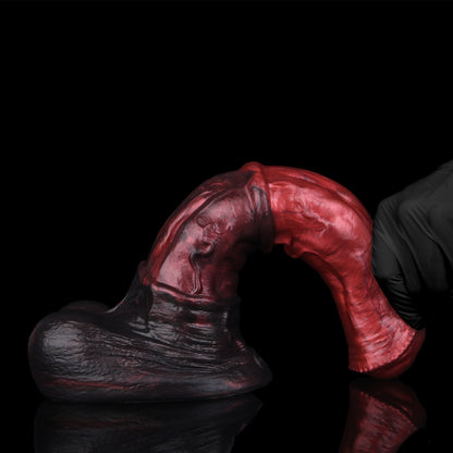 Atlas the Celestial Stallion dildo, Lava colorway, bent to demonstrate flexibility