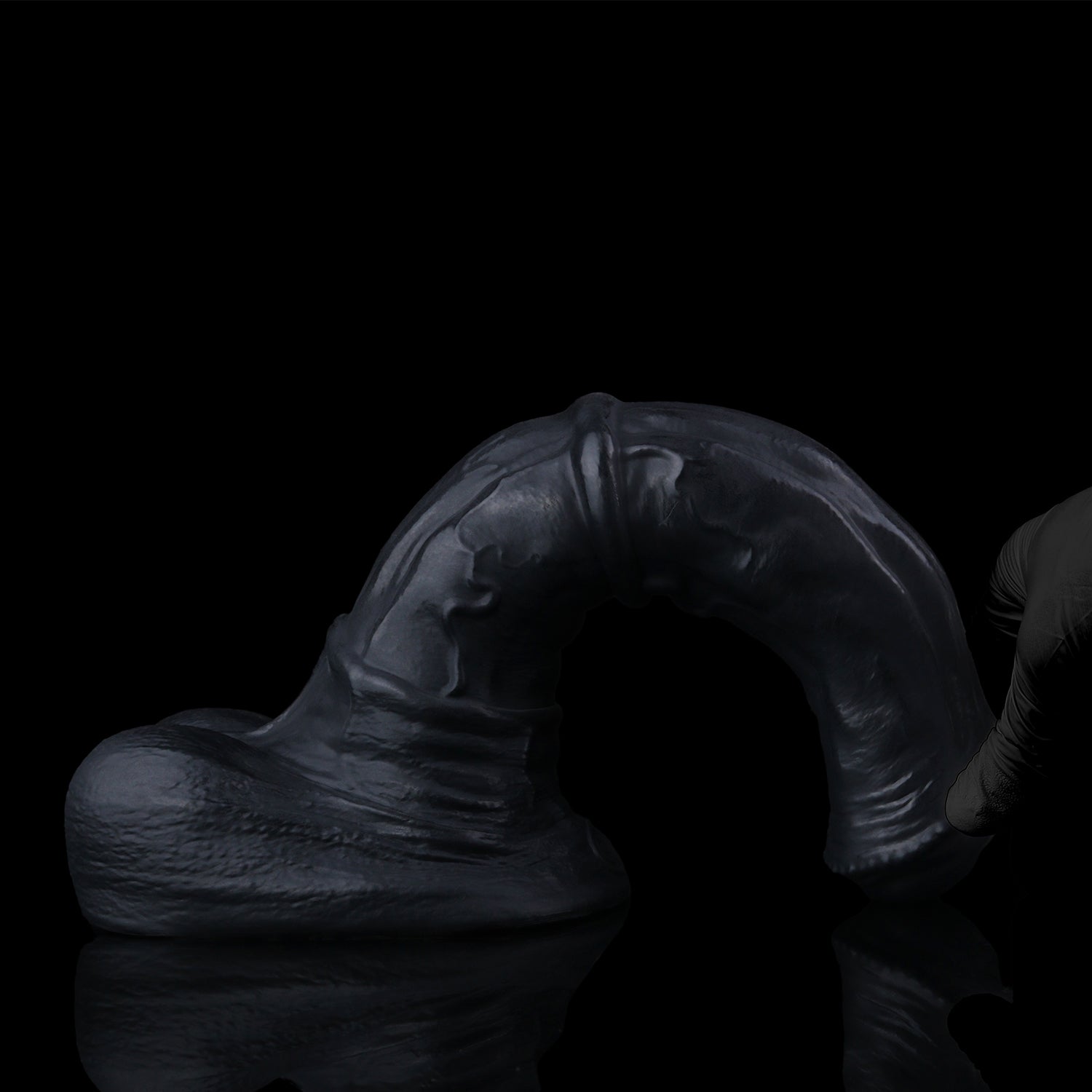 Atlas the Celestial Stallion dildo, Shadow colorway, bent to demonstrate flexibility