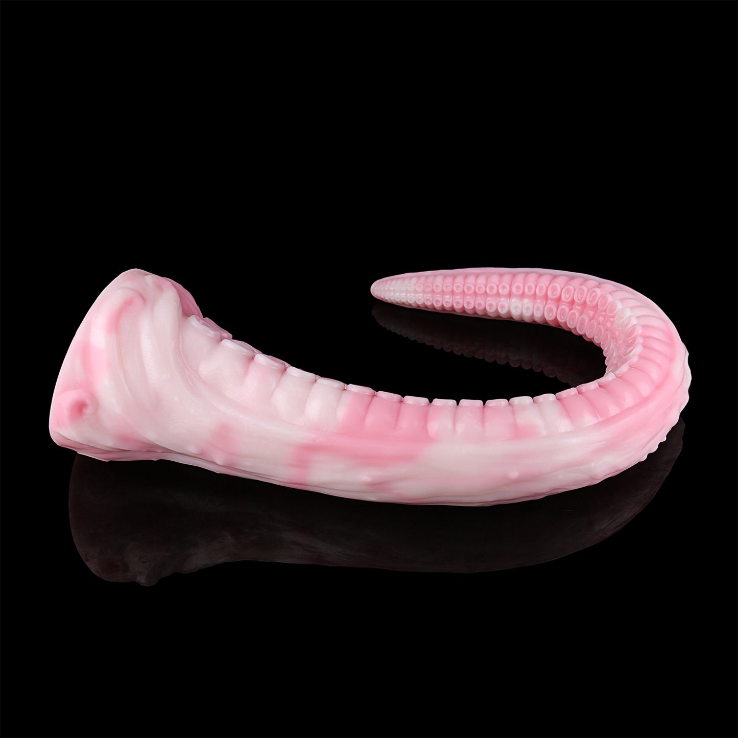 Coilor the Abyssal dildo, Fairy Floss colorway, curled to demonstrate flexibility