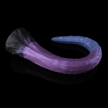 Coilor the Abyssal dildo, Spectre colorway, coiled to demonstrate flexibility