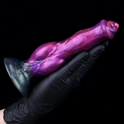 Darkhound the Canine Alpha dildo, Adrenaline colorway, held in a gloved hand at an angle showing the full length of the shaft