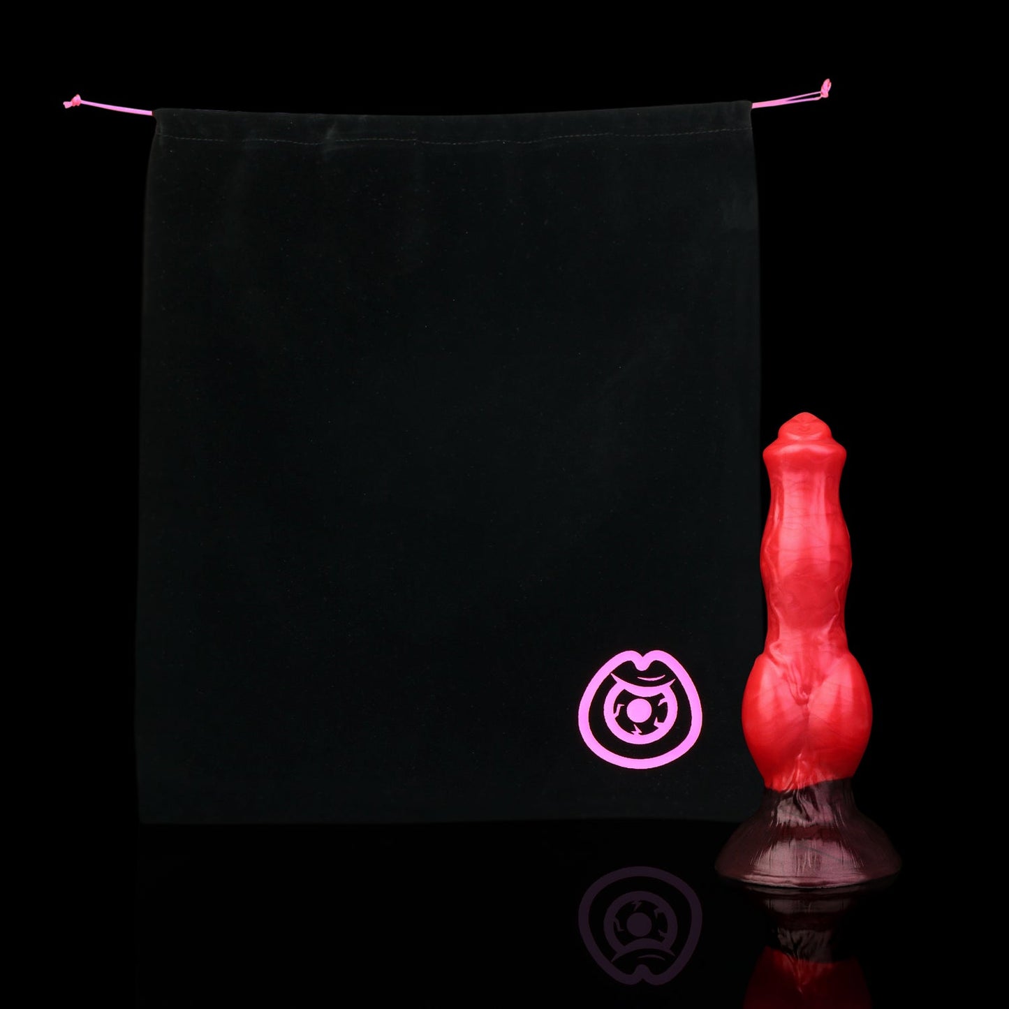 Darkhound the Canine Alpha dildo, Furnace colorway, shown alongside the included black Lunara's Realm storage pouch