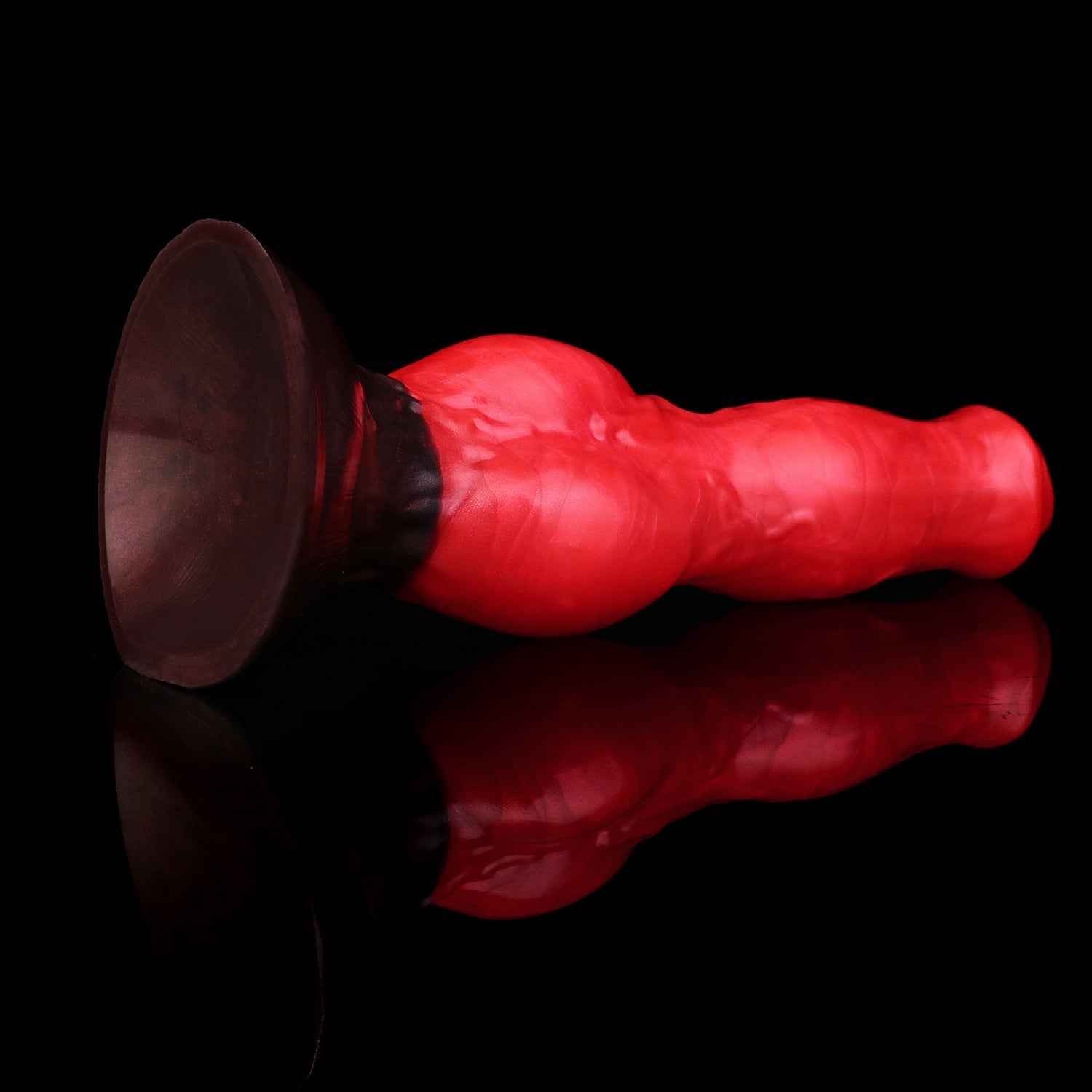 Darkhound the Canine Alpha dildo, Furnace colorway, angled to show the wide suction-cup base