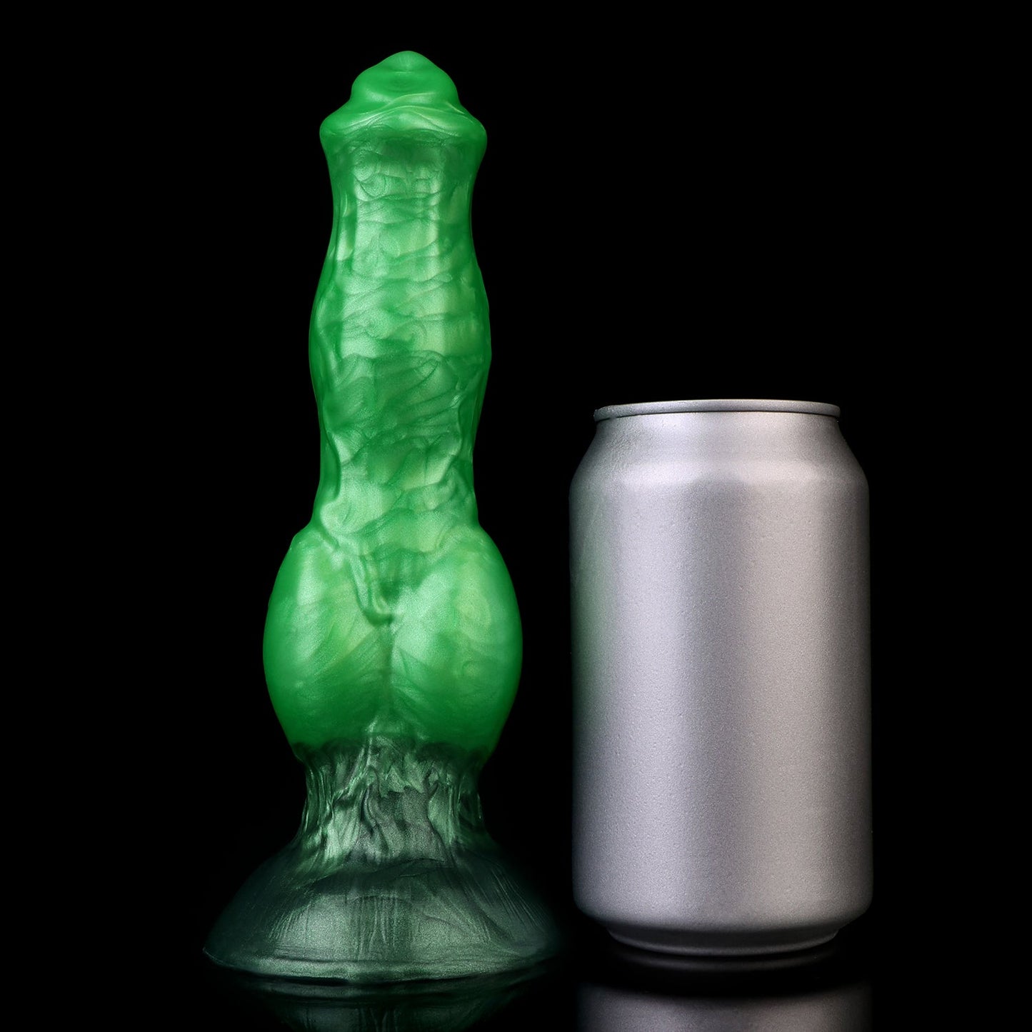 Darkhound the Canine Alpha dildo, Rampage colorway, standing upright beside a soda can for size comparison