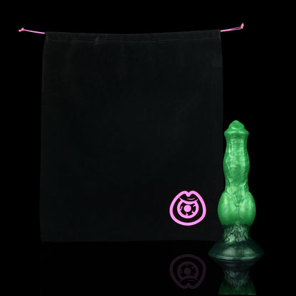Darkhound the Canine Alpha dildo, Rampage colorway, shown alongside the included black Lunara's Realm storage pouch