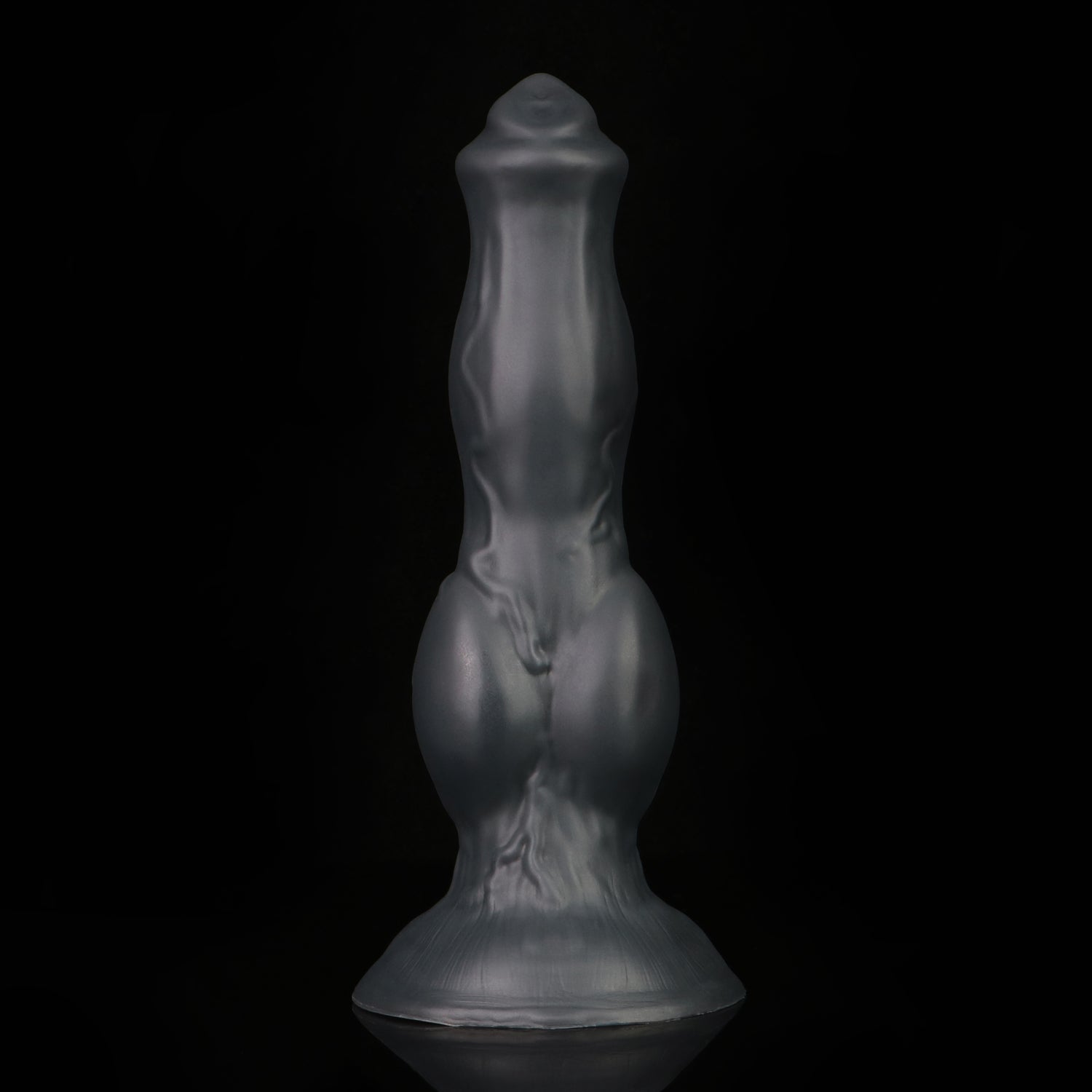 Darkhound the Canine Alpha dildo, Shadow colorway, standing upright in low-key lighting showing the deep low-sheen charcoal-black finish