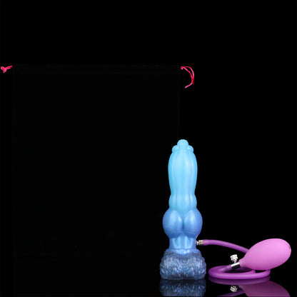 Evren the Moonfang dildo, Arctic colorway, shown with the included hand pump connected for inflating the shaft