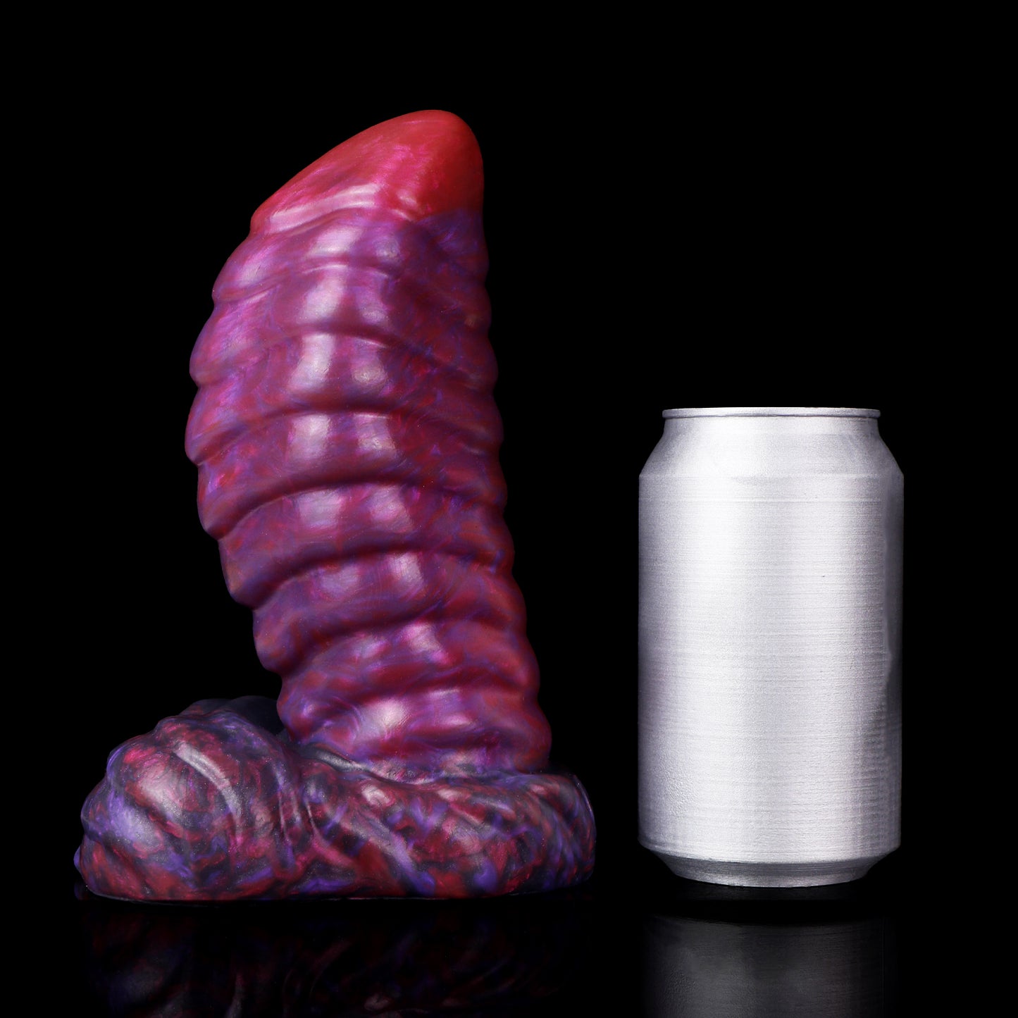 Kael the Dragonkin dildo, Adrenaline colorway, standing upright beside a soda can for size comparison