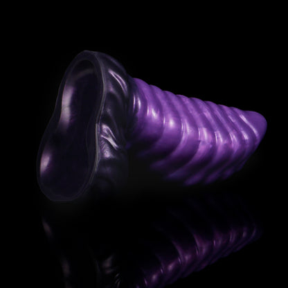 Kael the Dragonkin dildo, Grape colorway, tilted to show the underside of the scale-textured suction base