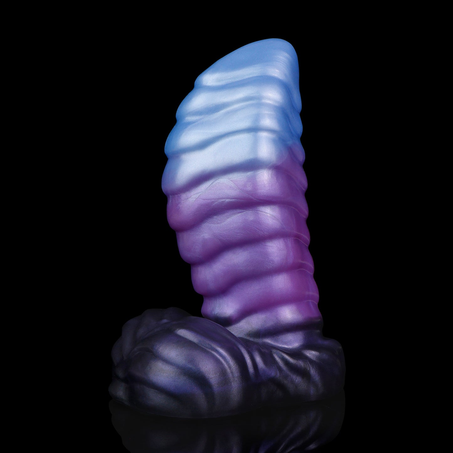 Kael the Dragonkin dildo, Spectre colorway, standing upright showing the ribbed segments along the shaft