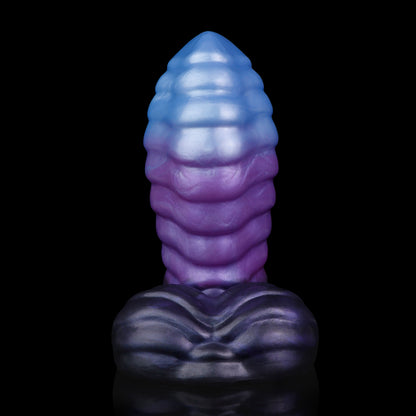 Kael the Dragonkin dildo, Spectre colorway, front-on view of the tapered tip and undulating scale-textured base