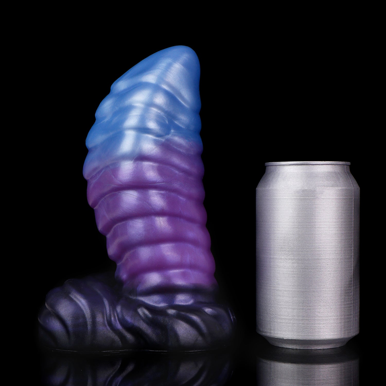 Kael the Dragonkin dildo, Spectre colorway, standing upright beside a soda can for size comparison