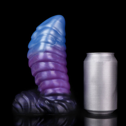 Kael the Dragonkin dildo, Spectre colorway, standing upright beside a soda can for size comparison