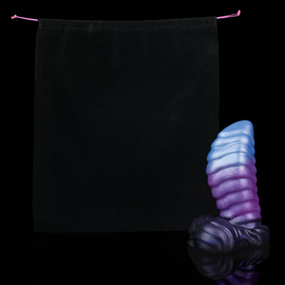 Kael the Dragonkin dildo, Spectre colorway, shown alongside the included black Lunara's Realm storage pouch