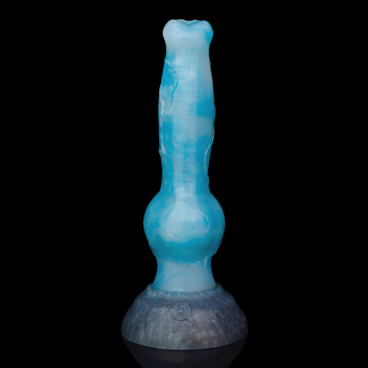 Koda the Guardian dildo, Blizzard colorway, standing upright on its rounded base showing the tapered head, veined shaft and knot