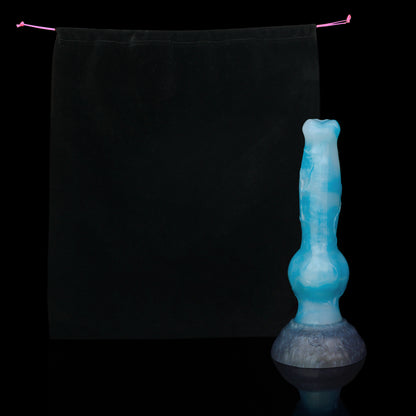 Koda the Guardian dildo, Blizzard colorway, shown alongside the included black Lunara's Realm storage pouch