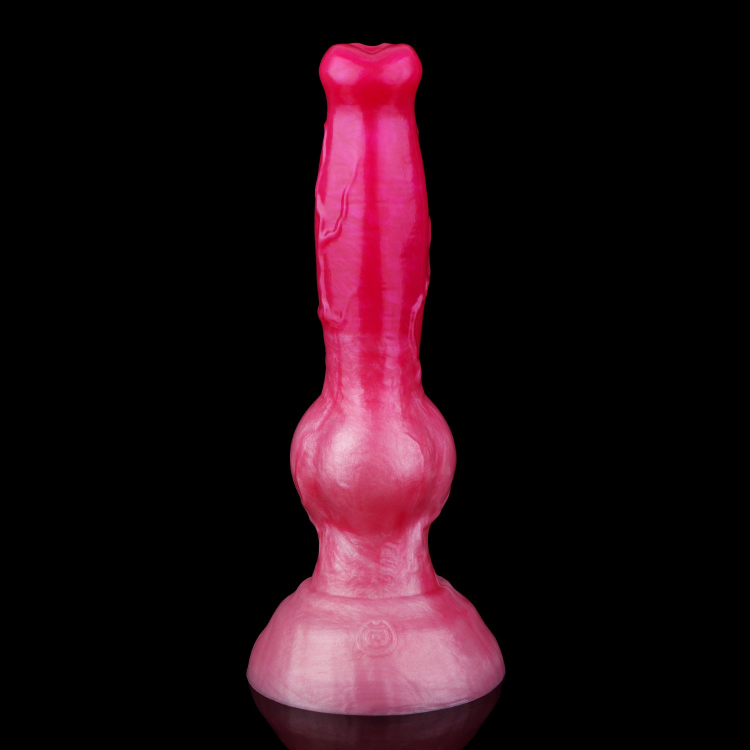 Koda the Guardian dildo, Blush colorway, standing upright on its rounded base showing the tapered head, veined shaft and knot