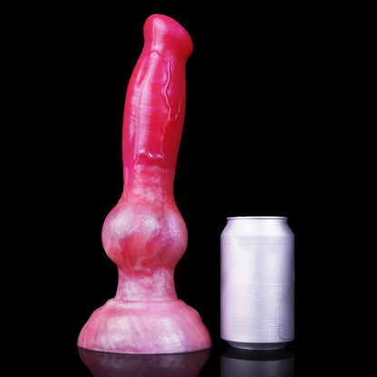 Koda the Guardian dildo, Blush colorway, standing upright beside a soda can for size comparison