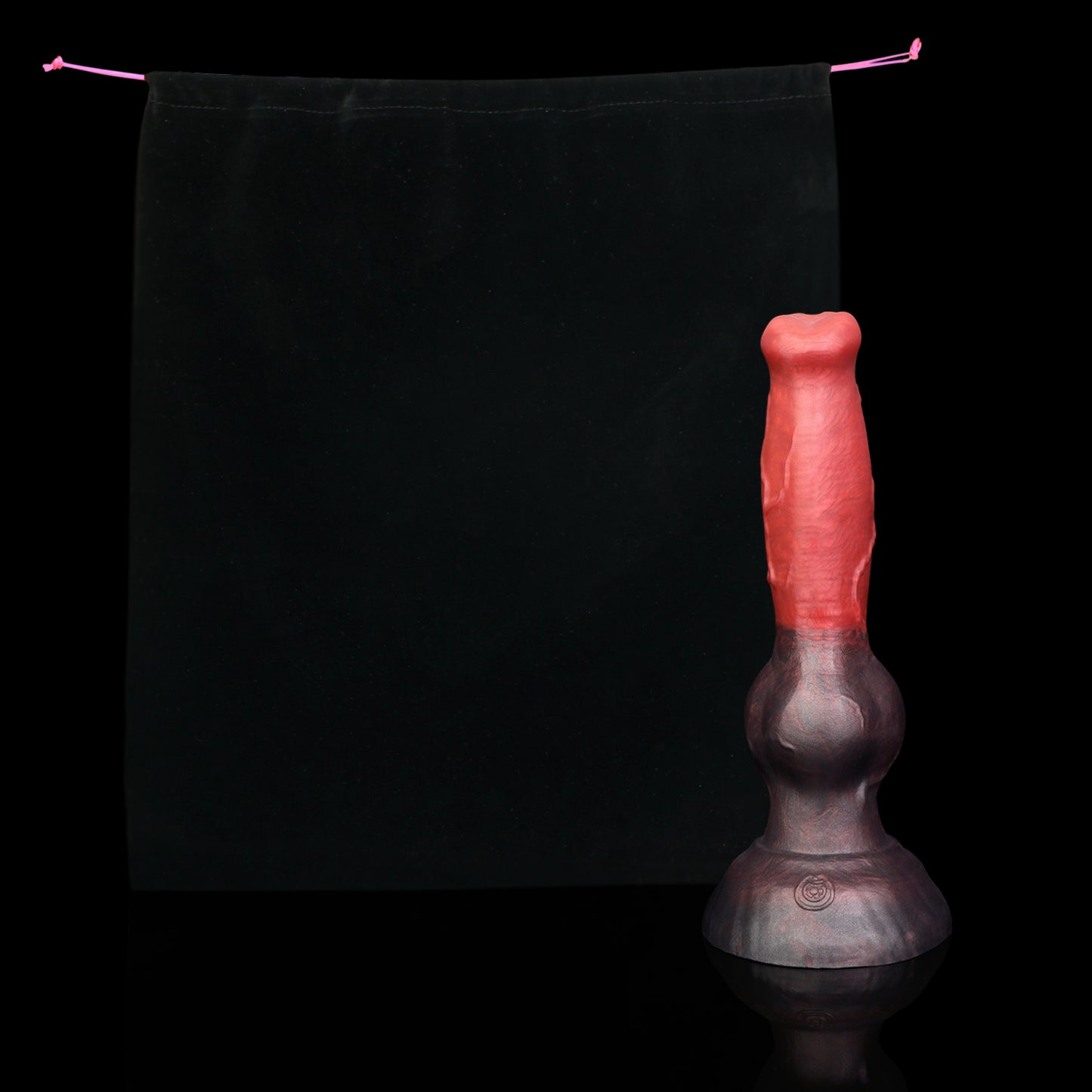Koda the Guardian dildo, Dusk colorway, shown alongside the included black Lunara's Realm storage pouch