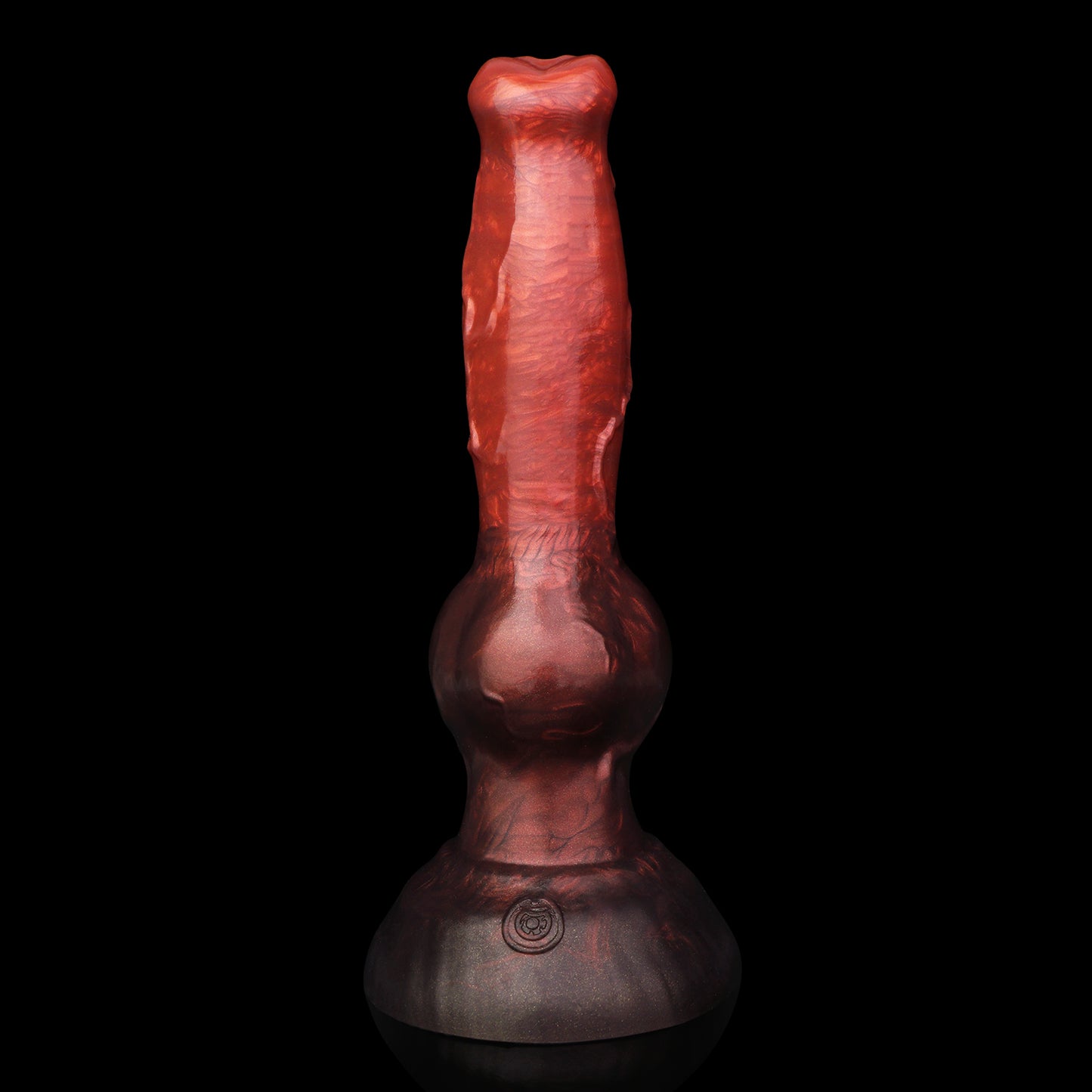 Koda the Guardian dildo, Lava colorway, standing upright on its rounded base showing the tapered head, veined shaft and knot