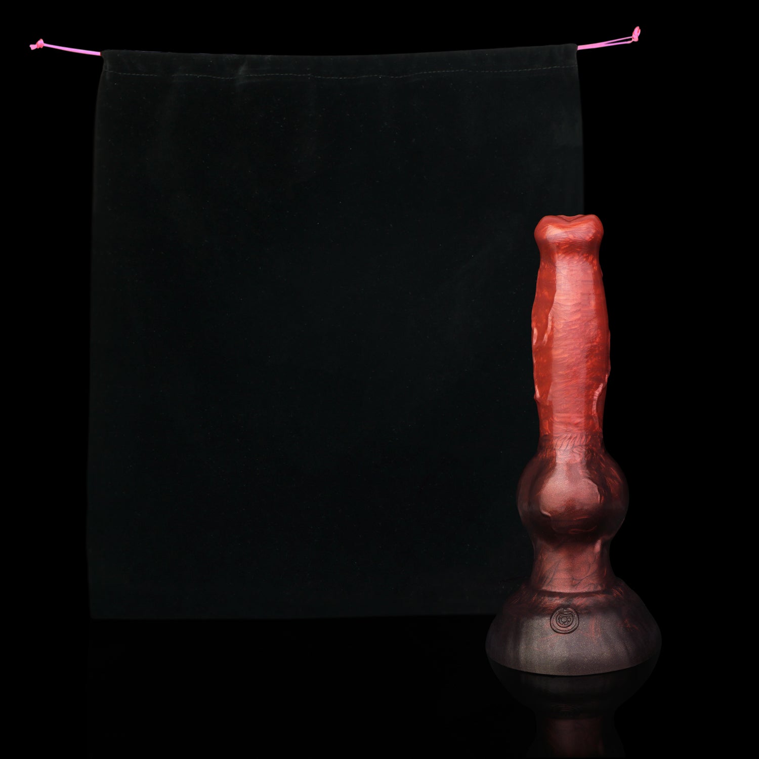 Koda the Guardian dildo, Lava colorway, shown alongside the included black Lunara's Realm storage pouch