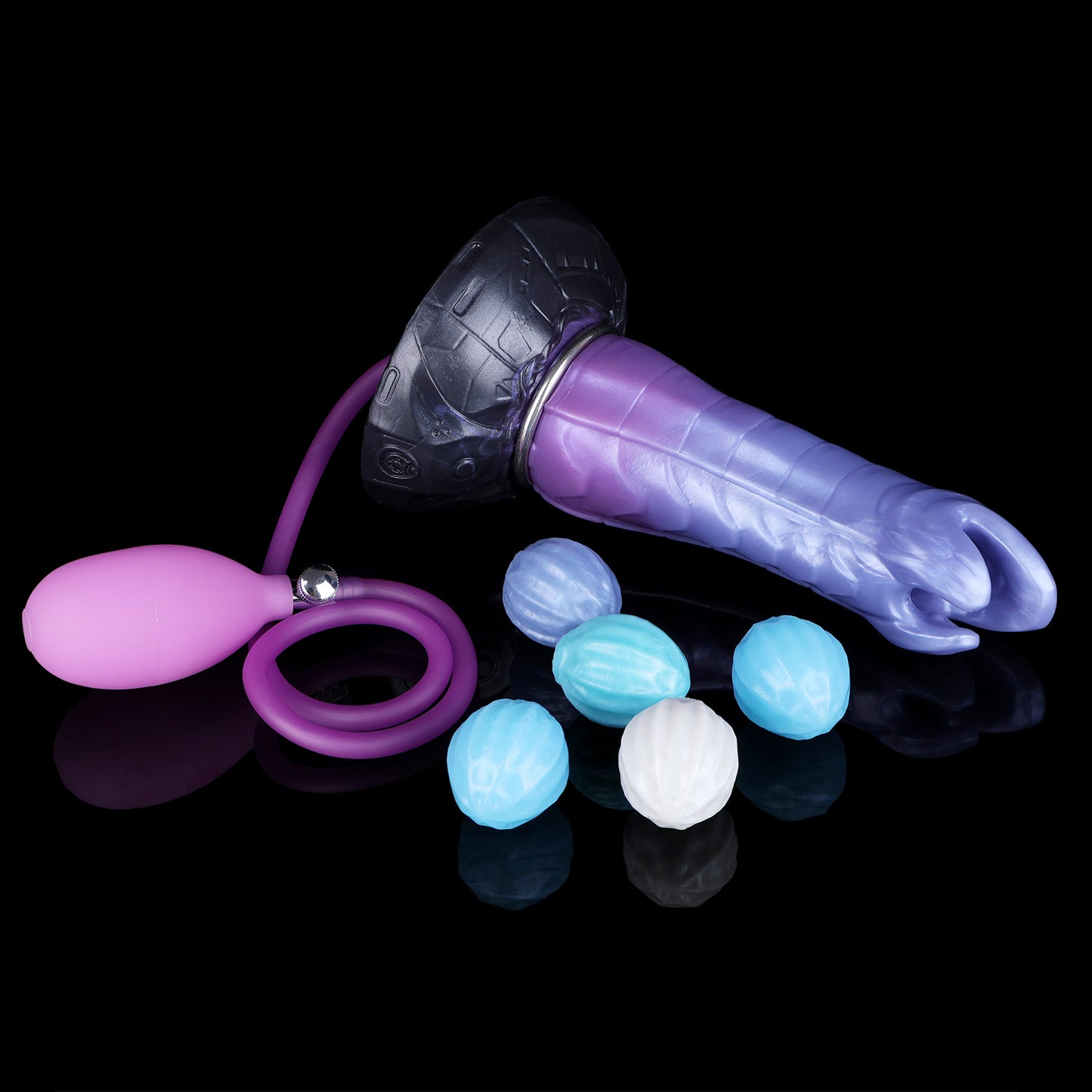 Kryptid the Breacher dildo, Spectre colorway, lying on its side alongside the pneumatic pump and interchangeable eggs