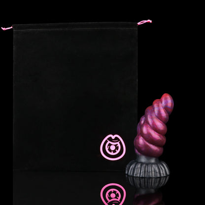 Larval the Alien Spawn dildo, Adrenaline colorway, shown alongside the included black Lunara's Realm storage pouch