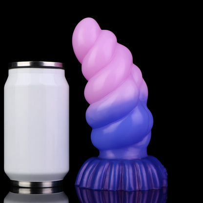 Larval the Alien Spawn dildo, Flux colorway, standing upright beside a soda can for size comparison