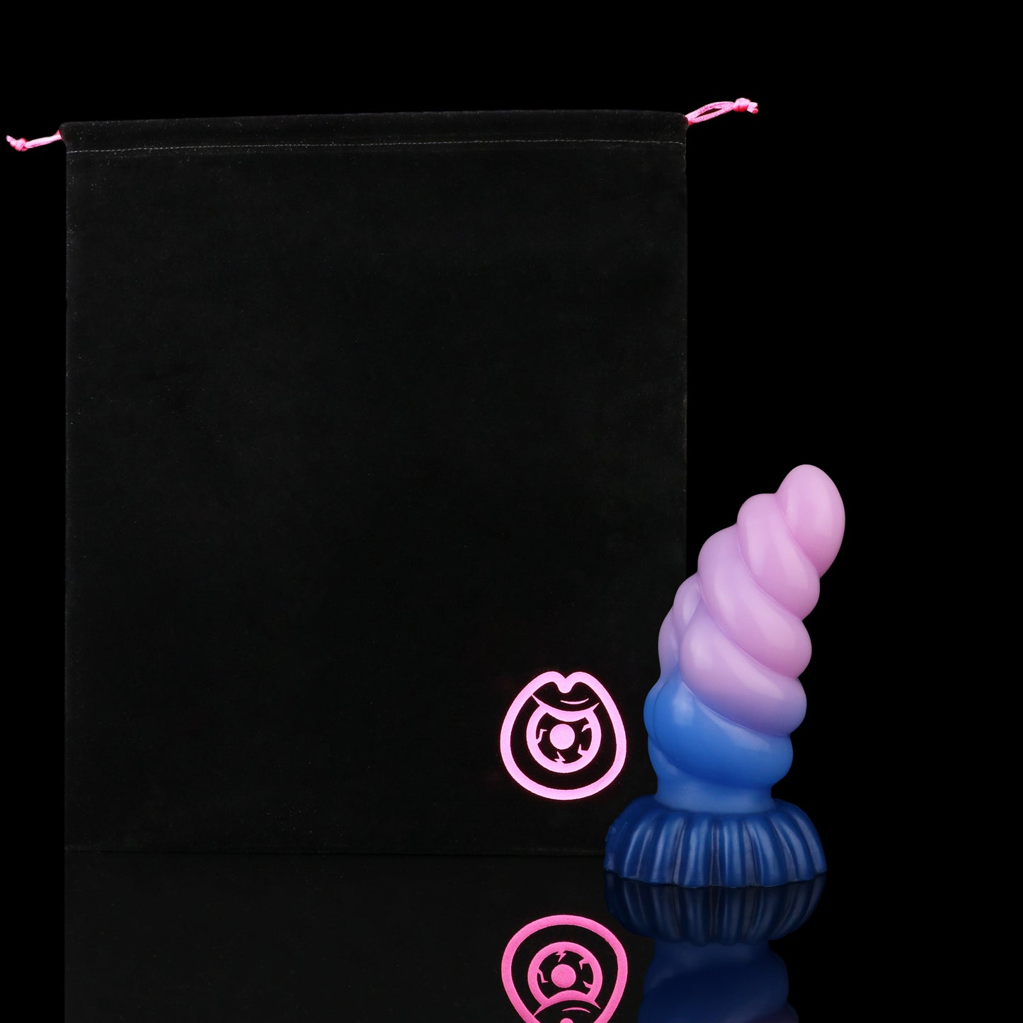 Larval the Alien Spawn dildo, Flux colorway, shown alongside the included black Lunara's Realm storage pouch