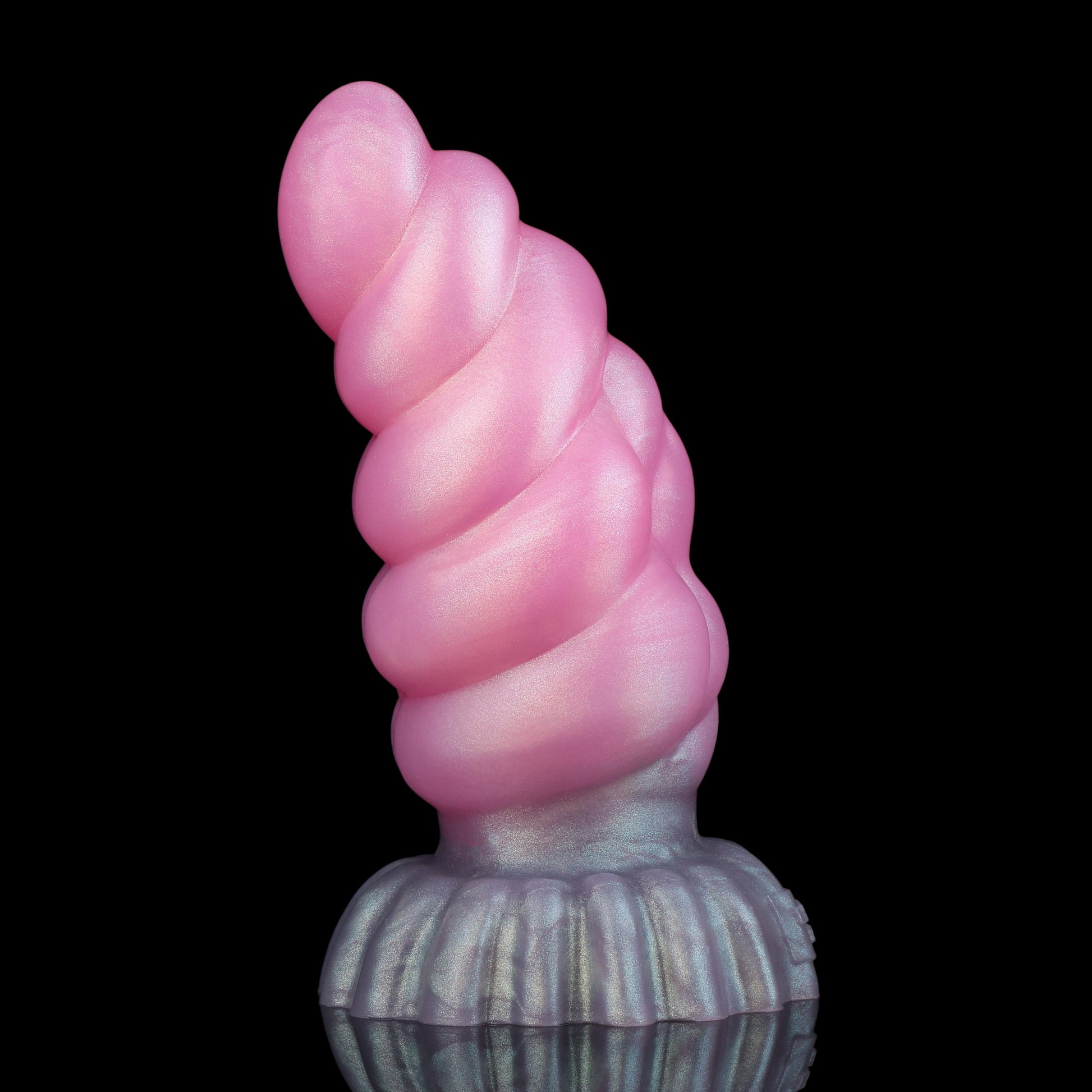 Larval the Alien Spawn dildo, Lick colorway, standing upright showing the arc of the curved, ribbed shaft