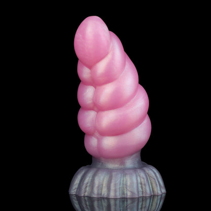 Larval the Alien Spawn dildo, Lick colorway, standing upright at an angle showing the segment ridges