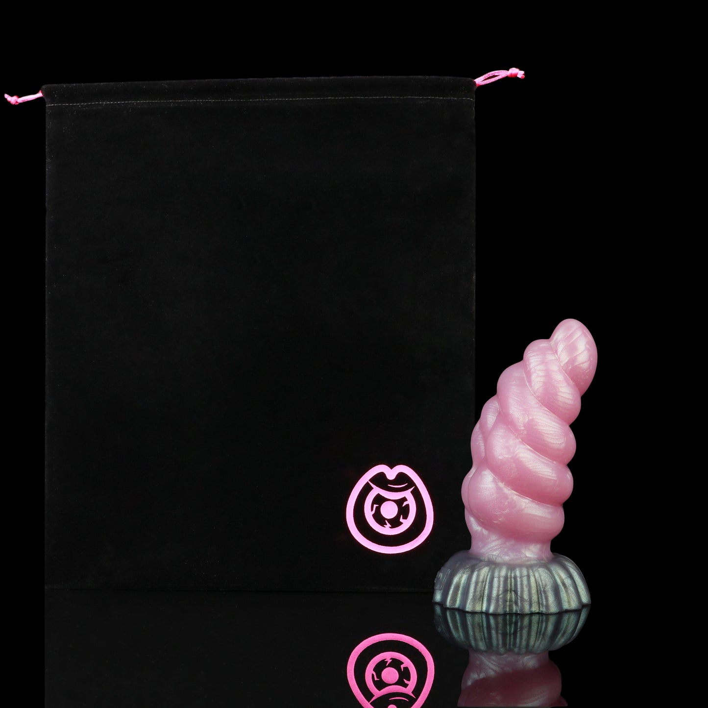 Larval the Alien Spawn dildo, Lick colorway, shown alongside the included black Lunara's Realm storage pouch