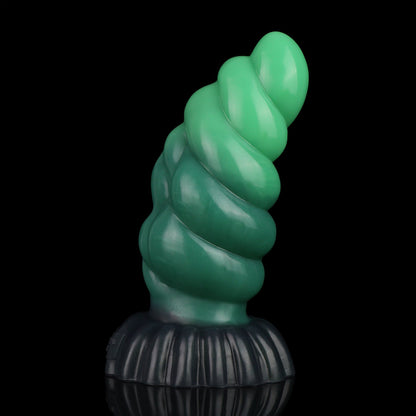 Larval the Alien Spawn dildo, Ogre colorway, standing upright showing the arc of the curved shaft