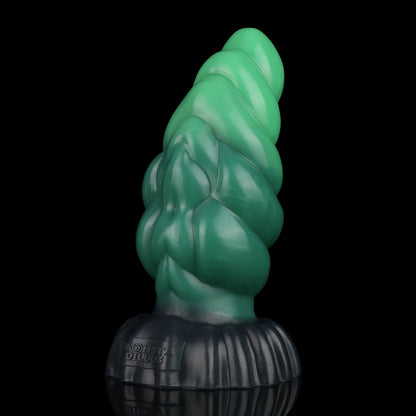 Larval the Alien Spawn dildo, Ogre colorway, standing upright at an angle showing the layered green segments