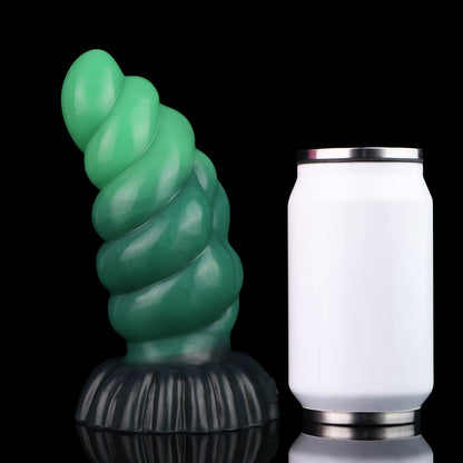 Larval the Alien Spawn dildo, Ogre colorway, standing upright beside a soda can for size comparison