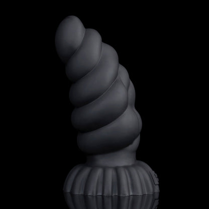 Larval the Alien Spawn dildo, Shadow colorway, standing upright showing the arc of the curved shaft