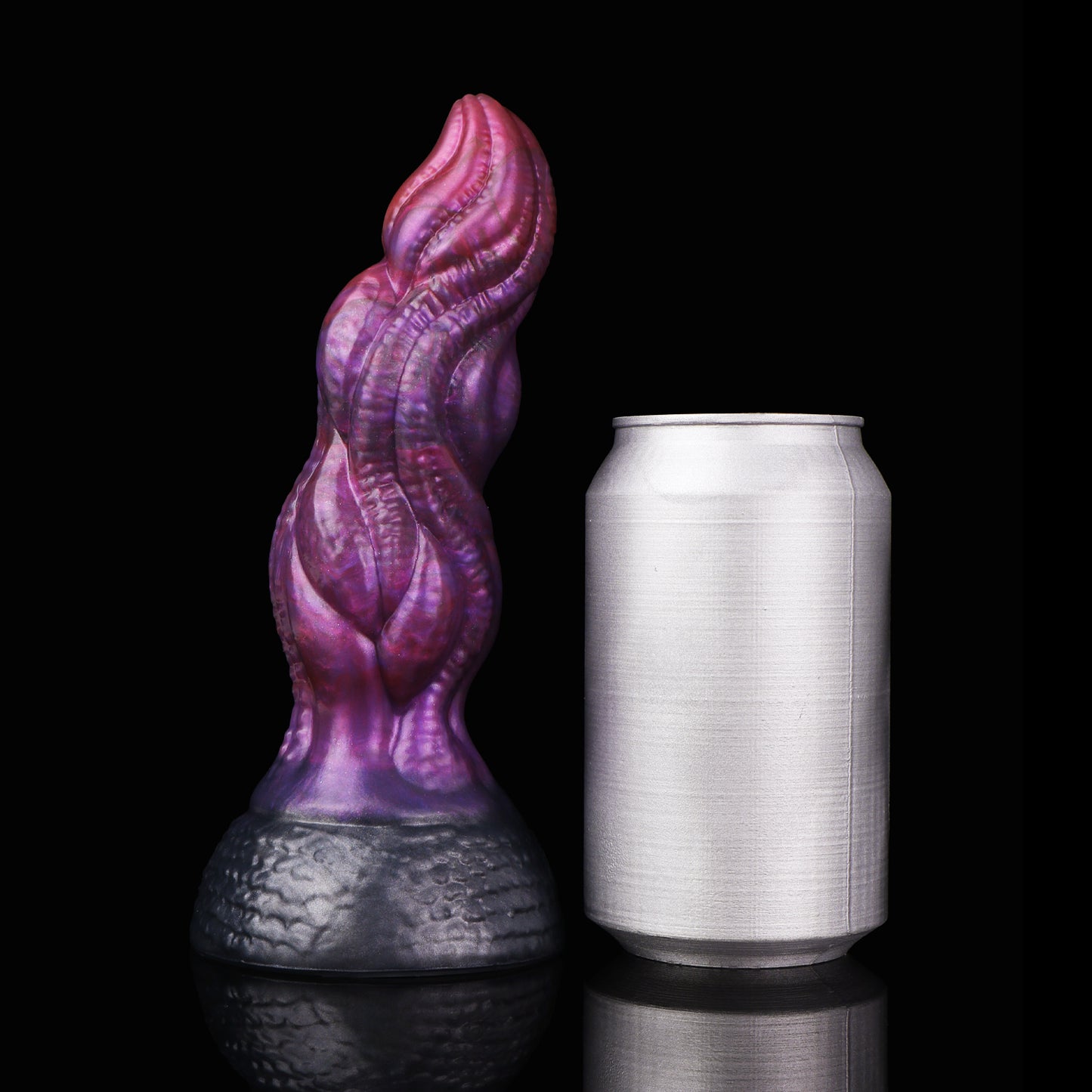 Lumen the Bloomborn dildo, Adrenaline colorway, standing upright beside a soda can for size comparison