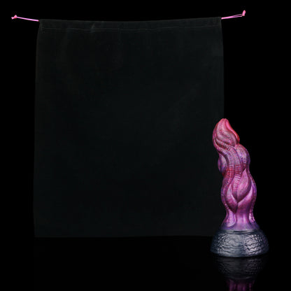 Lumen the Bloomborn dildo, Adrenaline colorway, shown alongside the included black Lunara's Realm storage pouch