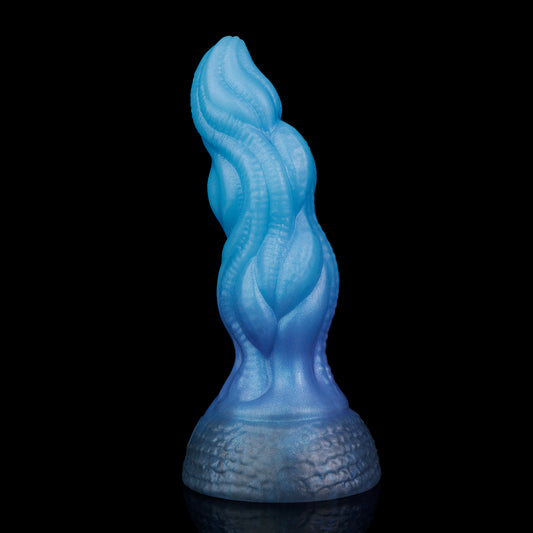 Lumen the Bloomborn dildo, Arctic colorway, standing upright showing the spiraling vein-like ribs winding the shaft