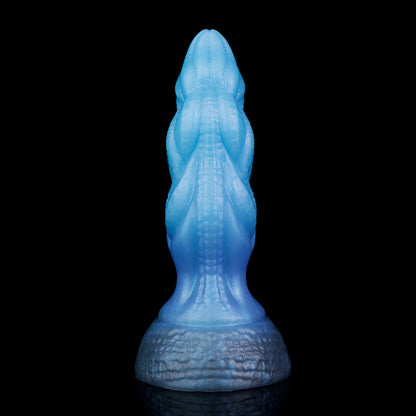 Lumen the Bloomborn dildo, Arctic colorway, standing upright showing the smooth bulbous tip and spiral ribbing