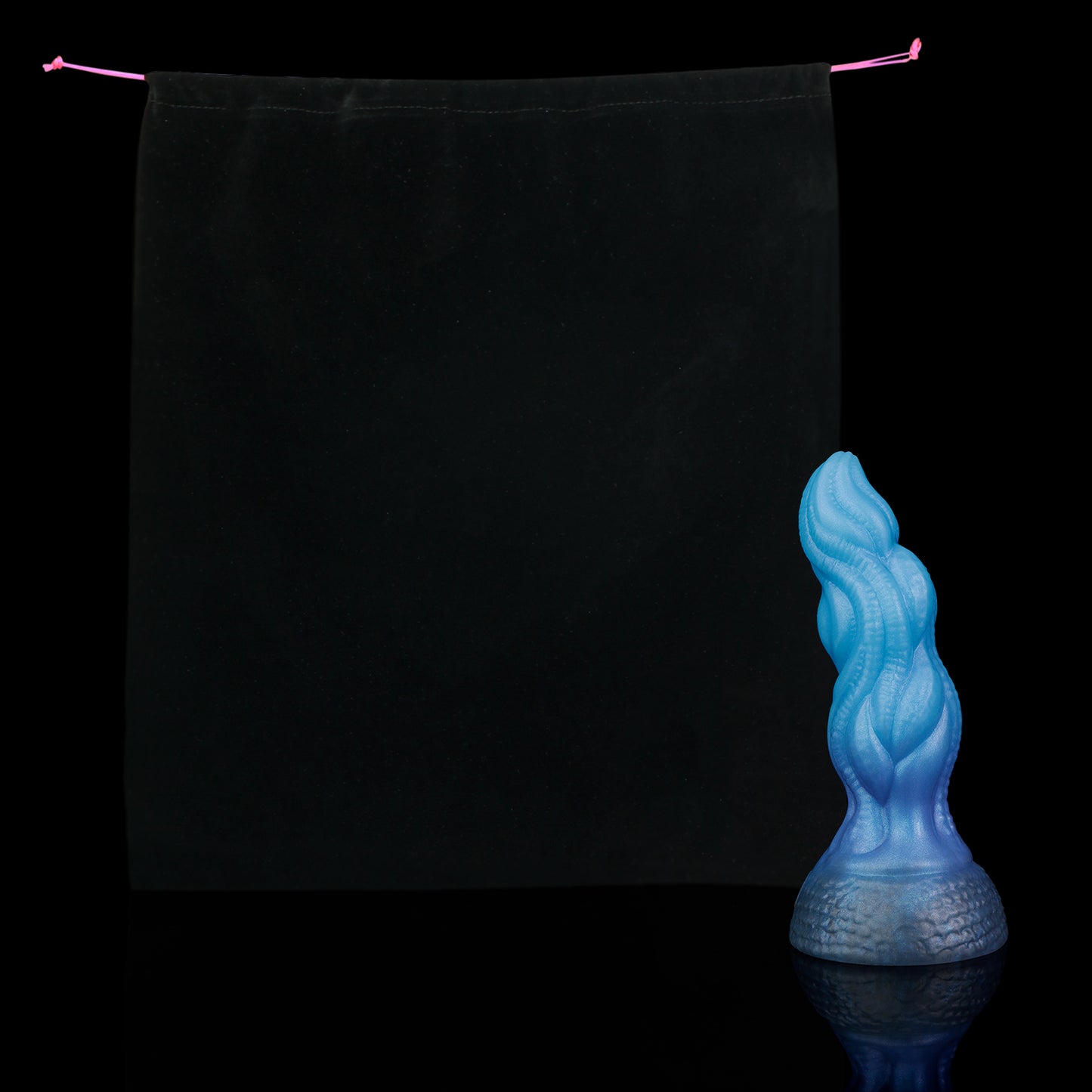 Lumen the Bloomborn dildo, Arctic colorway, shown alongside the included black Lunara's Realm storage pouch
