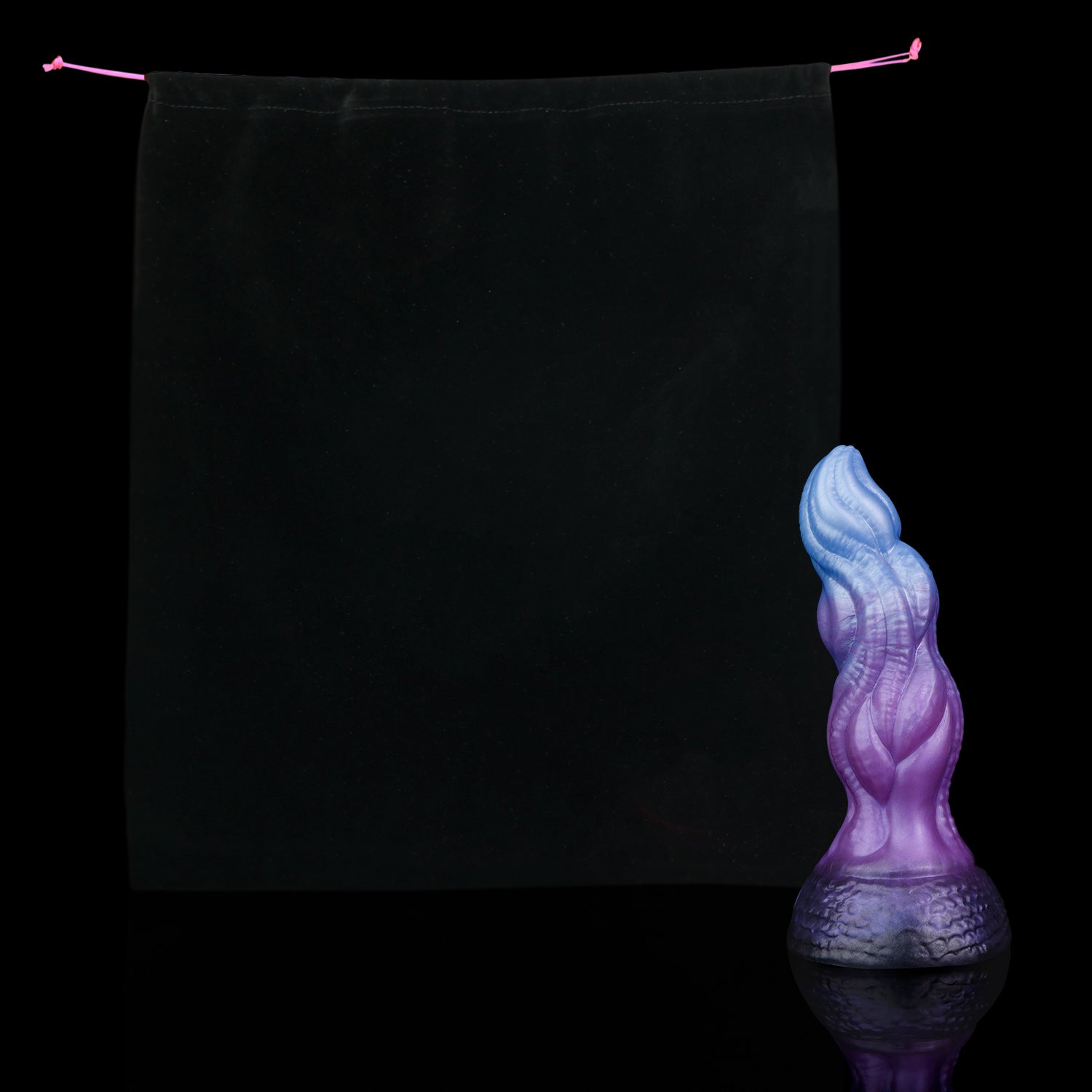 Lumen the Bloomborn dildo, Spectre colorway, shown alongside the included black Lunara's Realm storage pouch