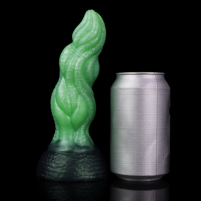 Lumen the Bloomborn dildo, Venom colorway, standing upright beside a soda can for size comparison