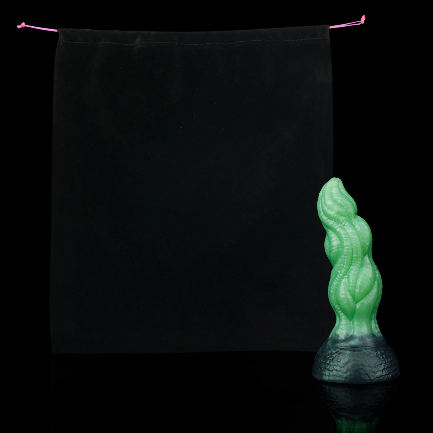 Lumen the Bloomborn dildo, Venom colorway, shown alongside the included black Lunara's Realm storage pouch