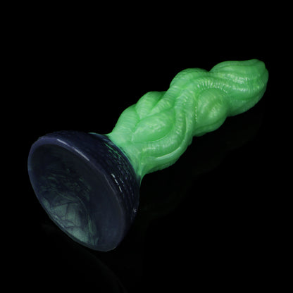 Lumen the Bloomborn dildo, Venom colorway, tilted to show the broad darkened suction-cup base
