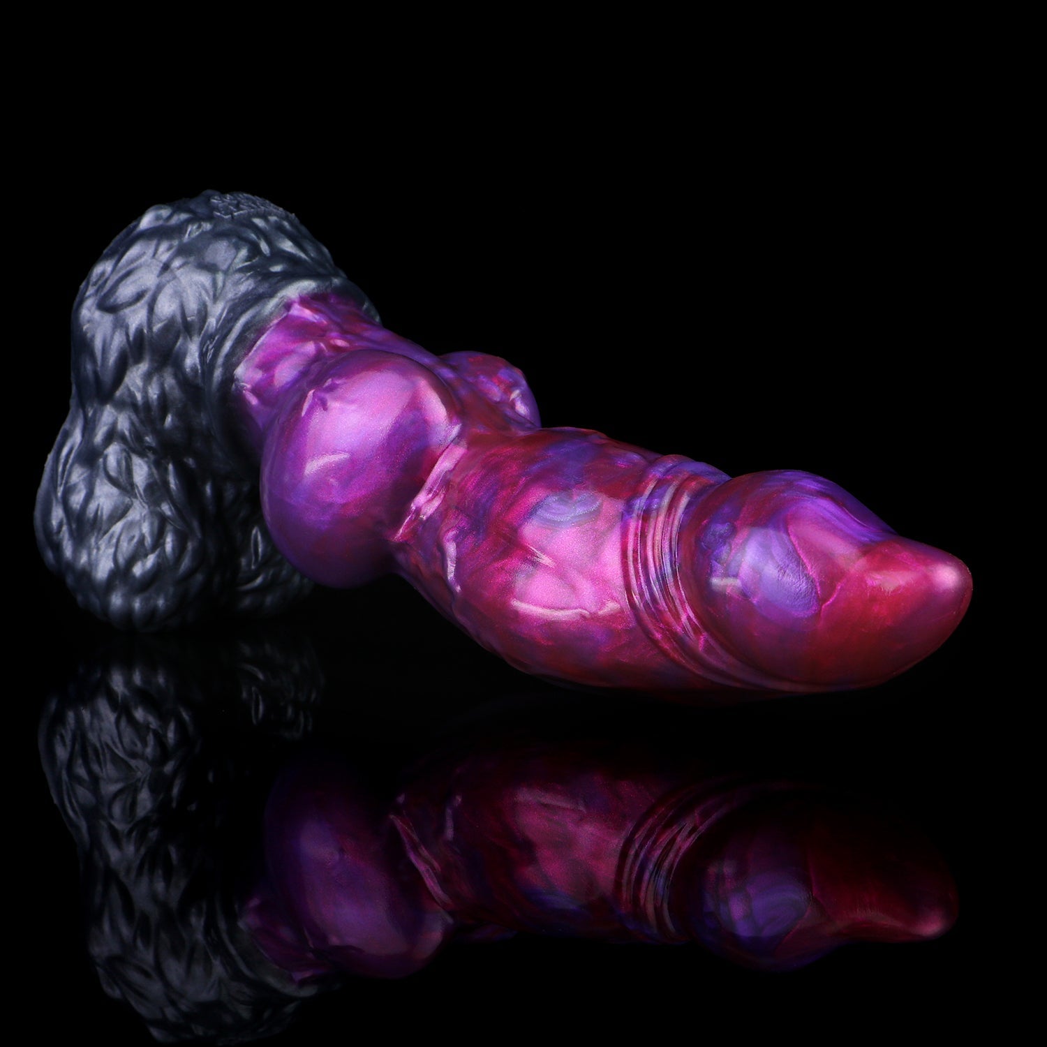 Lycan the Werewolf dildo, Adrenaline colorway, lying on its side in full profile showing metallic purple and crimson streaks over a gunmetal base