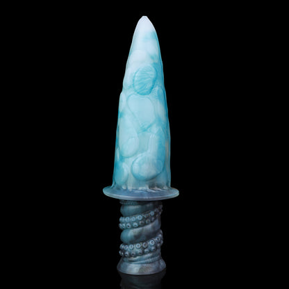 Moros the Deep One dildo, Abyss colorway, standing upright showing the smooth ribbed side of the coiled shaft